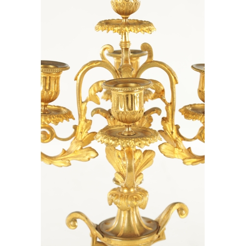 748 - A PAIR OF LATE 19TH CENTURY FRENCH ORMOLU CANDELABRA with five leaf work branches raised on urn-shap... 