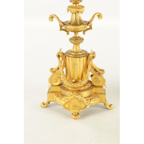 748 - A PAIR OF LATE 19TH CENTURY FRENCH ORMOLU CANDELABRA with five leaf work branches raised on urn-shap... 