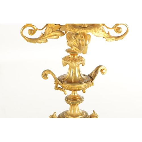 748 - A PAIR OF LATE 19TH CENTURY FRENCH ORMOLU CANDELABRA with five leaf work branches raised on urn-shap... 