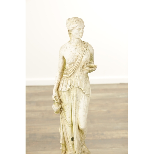 752 - A CARVED WHITE LIMESTONE OF A MAIDEN in classical dress mounted on a circular plinth base.