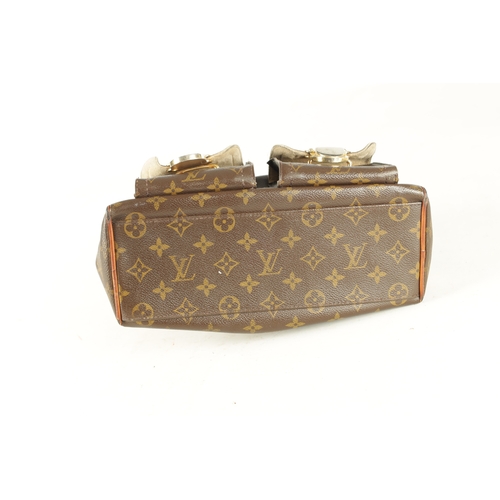 753 - A GENUINE LOUIS VUITTON MANHATTAN LEATHER HANDBAG with monogrammed decoration. (32cm wide, 18cm high... 