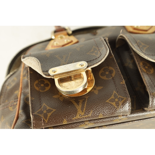 753 - A GENUINE LOUIS VUITTON MANHATTAN LEATHER HANDBAG with monogrammed decoration. (32cm wide, 18cm high... 