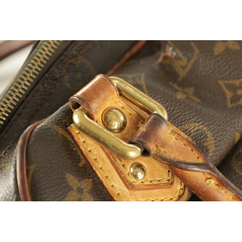 753 - A GENUINE LOUIS VUITTON MANHATTAN LEATHER HANDBAG with monogrammed decoration. (32cm wide, 18cm high... 