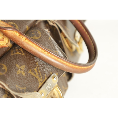 753 - A GENUINE LOUIS VUITTON MANHATTAN LEATHER HANDBAG with monogrammed decoration. (32cm wide, 18cm high... 