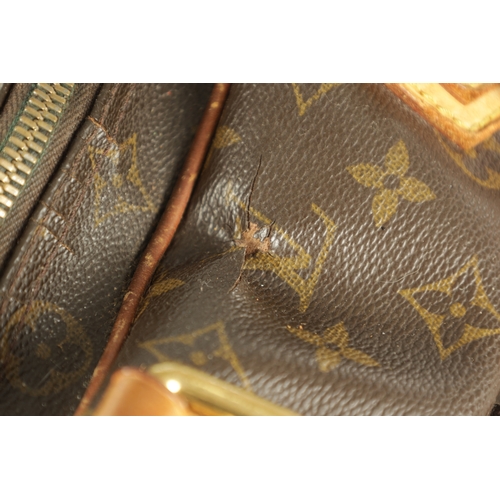 753 - A GENUINE LOUIS VUITTON MANHATTAN LEATHER HANDBAG with monogrammed decoration. (32cm wide, 18cm high... 