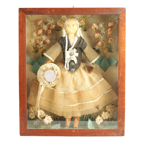 757 - A 19TH CENTURY WAX OVER DOLL FIGURE IN A GLAZED DISPLAY CABINET in full dress with floral decoration... 