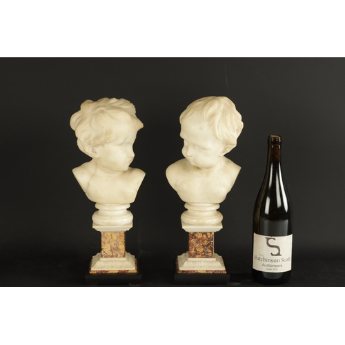 758 - A PAIR OF GEORGE III CARVED WHITE MARBLE BUSTS OF PUTTI raised on marble square plinth bases (38cm h... 