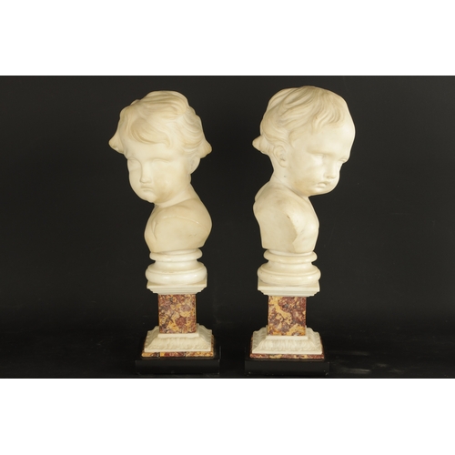 758 - A PAIR OF GEORGE III CARVED WHITE MARBLE BUSTS OF PUTTI raised on marble square plinth bases (38cm h... 