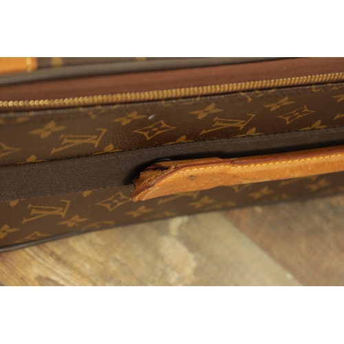 766 - A GENUINE LOUIS VUITTON CABIN SUITCASE with monogrammed decoration and brown leather carrying handle... 