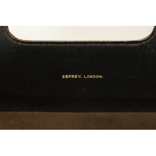 772 - ASPREY, LONDON. A STYLISH VINTAGE LEATHER AND GILT BRASS MAGAZINE RACK stamped to the inside having ... 