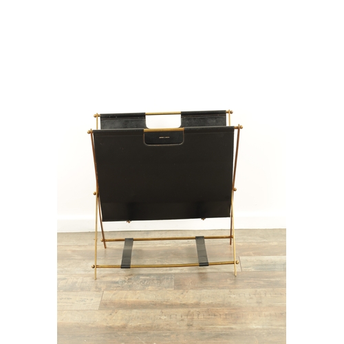 772 - ASPREY, LONDON. A STYLISH VINTAGE LEATHER AND GILT BRASS MAGAZINE RACK stamped to the inside having ... 