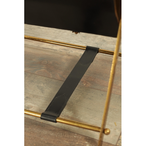 772 - ASPREY, LONDON. A STYLISH VINTAGE LEATHER AND GILT BRASS MAGAZINE RACK stamped to the inside having ... 