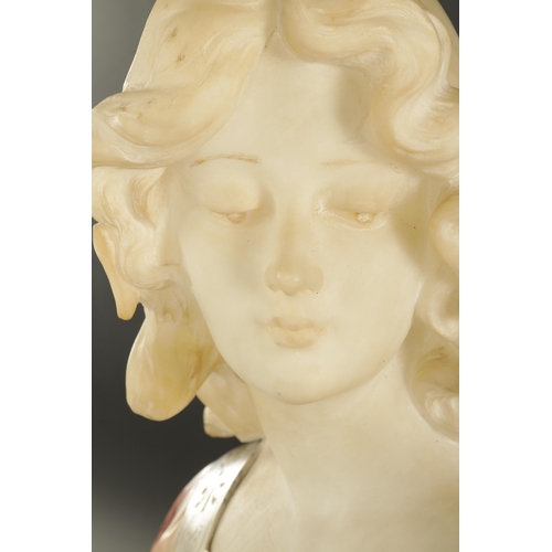 775 - AN ART DECO CARVED MIXED MARBLE BUST OF A YOUNG LADY signed to reverse. (48cm high)