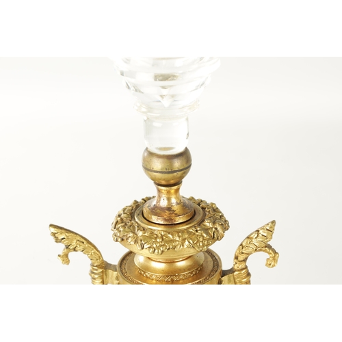 776 - A PAIR OF LATE 19TH CENTURY REGENCY STYLE FRENCH ORMOLU AND CUT GLASS CANDELABRA with twin candle sc... 