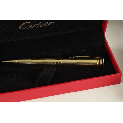 777 - A CARTIER PEN, CARTIER WALLET TOGETHER WITH AN AIGNER PEN in original boxes