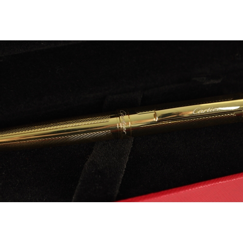 777 - A CARTIER PEN, CARTIER WALLET TOGETHER WITH AN AIGNER PEN in original boxes