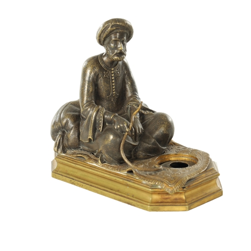 778 - A LATE 19TH CENTURY BERGMAN-TYPE EASTERN BRONZE SCULPTURE. modelled as a seated snake charmer figure... 