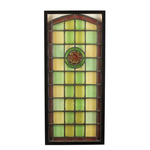 779 - A LATE 19TH CENTURY LEADED COLOURED STAIN GLASS WINDOW of square panels enclosing a central bird and... 