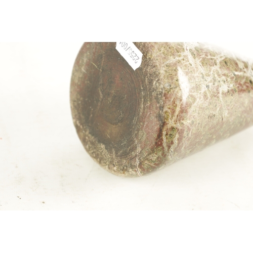 784 - A 19TH CENTURY SERPENTINE MARBLE DOORSTOP with brass ring carrying handle (20cm high )