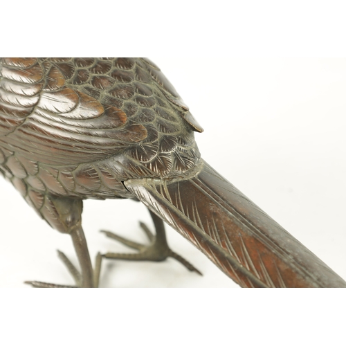 786 - A 19TH CENTURY BRONZE BIRD SCULPTURE of a standing pheasant (44.5cm length and 15cm high)