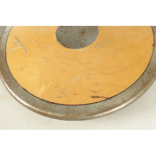 787 - TWO VINTAGE WOOD AND STEEL THROWING DISCUSS one stamped Cantabrian Made in England (22cm and 21cm di... 