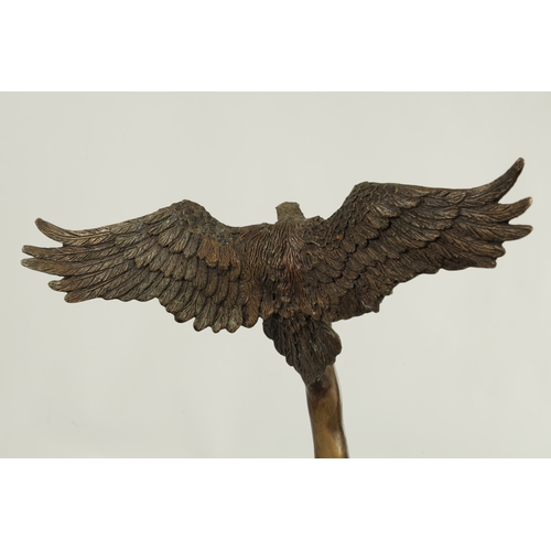 789 - A 20TH CENTURY BRONZE SCULPTURE depicting as semi-nude male with an eagle - signed Denis on a marble... 