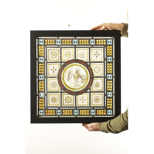 790 - A LATE 19TH CENTURY COLOURED STAIN GLASS WINDOW of leaded differing geometric designs enclosing a ce... 