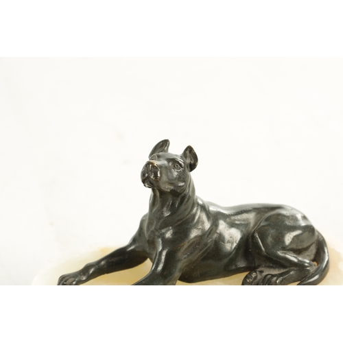 791 - A 19TH CENTURY FRENCH BRONZE AND WHITE ONYX RECUMBENT DOG DESK PAPERWEIGHT with dark green patinated... 