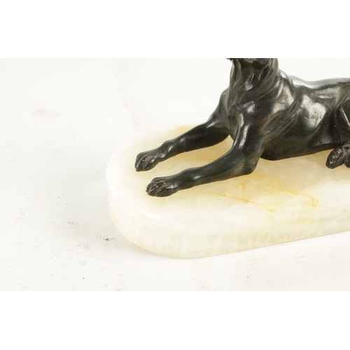 791 - A 19TH CENTURY FRENCH BRONZE AND WHITE ONYX RECUMBENT DOG DESK PAPERWEIGHT with dark green patinated... 