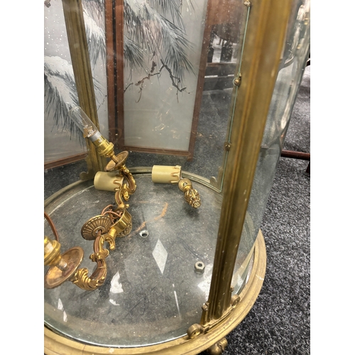 803 - A LARGE 20TH CENTURY GILT BRASS HANGING HALL LANTERN having leaf cast circular frame and glazed hing... 