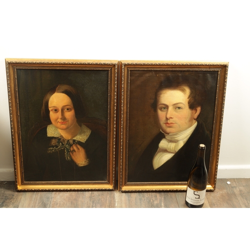 825 - A PAIR OF 19TH CENTURY OILS ON CANVAS LAID ON BOARD depicting portraits of a lady and gentleman, uns... 