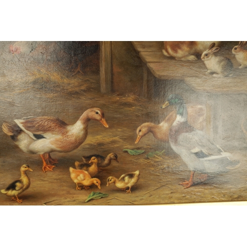 826 - EDGAR HUNT - OIL ON CANVAS a farm yard gathering of poultry, ducks and rabbits on a trestle. signed ... 