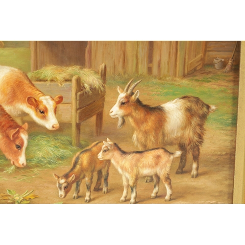 829 - EDGAR HUNT - OIL ON CANVAS BOARD calves and goats in a farmstead. Signed and dated 1948. Swept gilt ... 