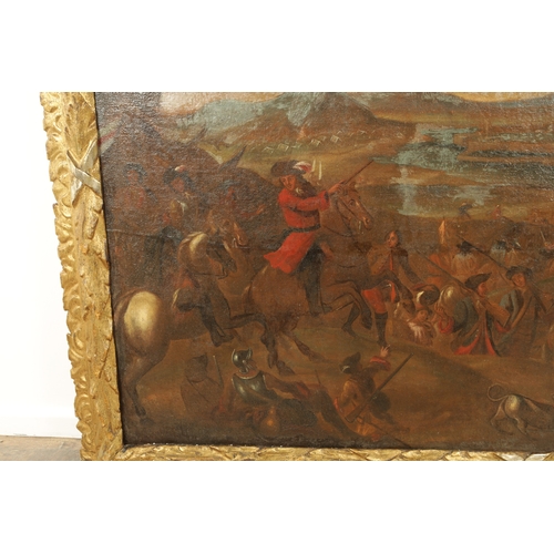 833 - AN 18TH CENTURY DUTCH OIL PAINTING AFTER JAN WYCK of the battle of Boyne - unsigned in carved gilt f... 