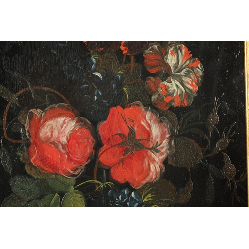 859 - AN 18TH CENTURY DUTCH SCHOOL OIL ON COPPER depicting roses and lilies - mounted in a gilt ebonised m... 