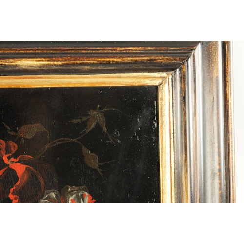 859 - AN 18TH CENTURY DUTCH SCHOOL OIL ON COPPER depicting roses and lilies - mounted in a gilt ebonised m... 