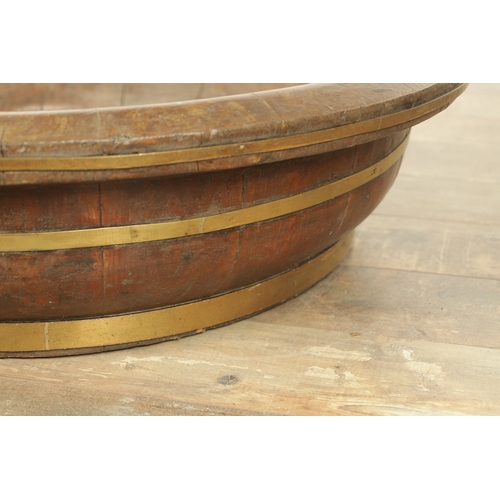 885 - A LARGE 19TH CENTURY PITCH PINE COOPERED BOWL OF LARGE SIZE with shaped sides and brass bands (77cm ... 