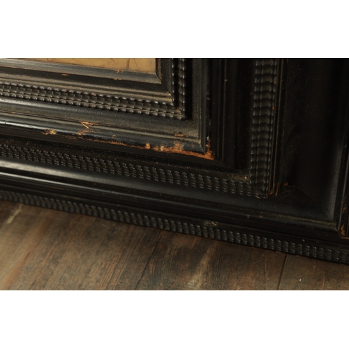 893 - A FINE EARLY 19TH CENTURY CONTINENTAL CARVED LIME WOOD TAVERN SCENE in a moulded ebonised frame (36c... 