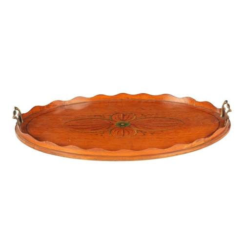 903 - A LATE 19TH CENTURY PAINTED SATINWOOD OVAL TRAY with shaped gallery and brass side handles. (65cm wi... 