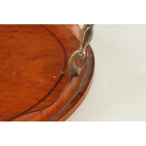 903 - A LATE 19TH CENTURY PAINTED SATINWOOD OVAL TRAY with shaped gallery and brass side handles. (65cm wi... 