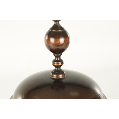 904 - A 17TH CENTURY STYLE TURNED WALNUT ALTER CHALICE AND COVER having turned finial above a bulbous body... 