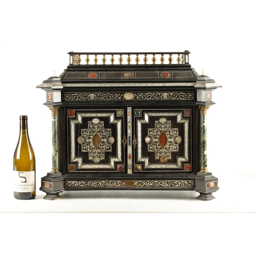 906 - A 19TH CENTURY ITALIAN EBONISED AND IVORY INLAID COLLECTORS CABINET with precious stone medallions, ... 