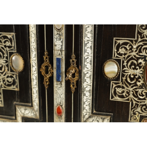 906 - A 19TH CENTURY ITALIAN EBONISED AND IVORY INLAID COLLECTORS CABINET with precious stone medallions, ... 