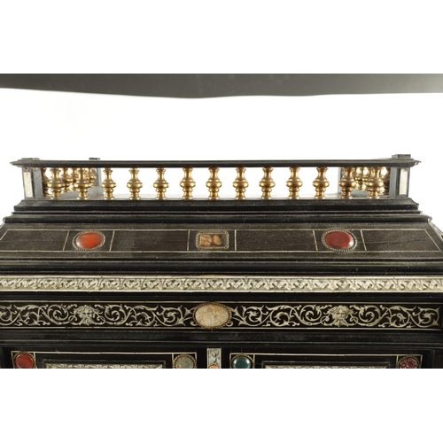 906 - A 19TH CENTURY ITALIAN EBONISED AND IVORY INLAID COLLECTORS CABINET with precious stone medallions, ... 