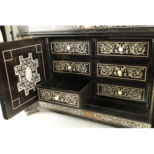 906 - A 19TH CENTURY ITALIAN EBONISED AND IVORY INLAID COLLECTORS CABINET with precious stone medallions, ... 