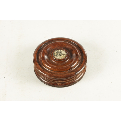 909 - A GEORGE III TREEN TURNED WALNUT SNUFF BOX with engraved bone centre depicting Lancaster Castle (13c... 