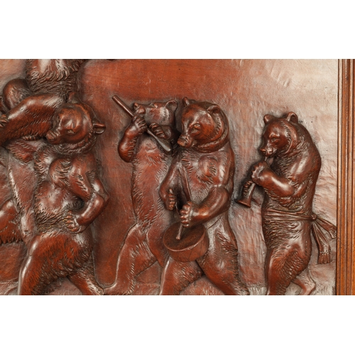 914 - A GOOD LATE 19TH CENTURY CARVED LINDEN WOOD BLACK FOREST HANGING PLAQUE depicting bears playing inst... 