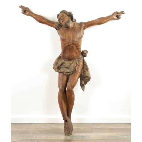 915 - AN EARLY 15TH/16TH CENTURY CONTINENTAL CARVED OAK AND POLYCHROME CORPUS CHRISTI. (108cm high, 92cm w... 