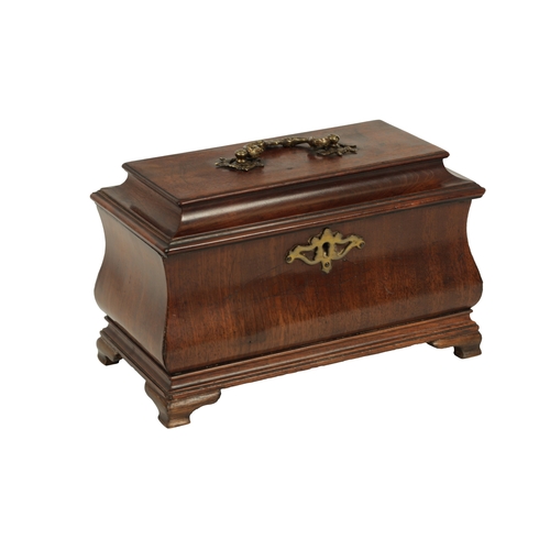 917 - AN UNUSUAL EARLY GEORGE III MAHOGANY TEA CADDY OF OGEE SHAPE the hinged moulded top with folding bra... 