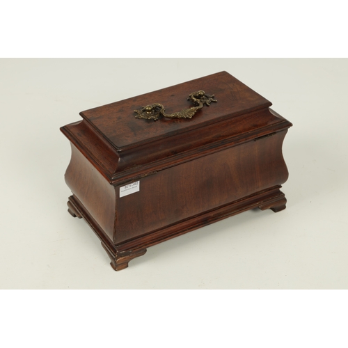 917 - AN UNUSUAL EARLY GEORGE III MAHOGANY TEA CADDY OF OGEE SHAPE the hinged moulded top with folding bra... 